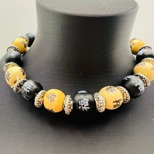 Vintage Black Yellow Wooden Bead Asian Symbol Stretch Bracelet